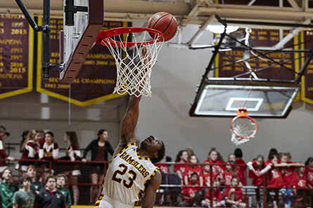 Ramblers Player tips the ball into the hoop.